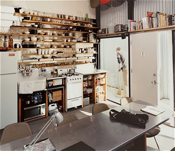 Muebles de cocina a medida con estanterias abiertas en zona norte de