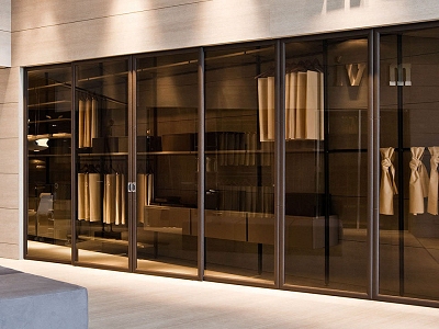 Vestidor con puertas corredizas de vidrio tonalizado